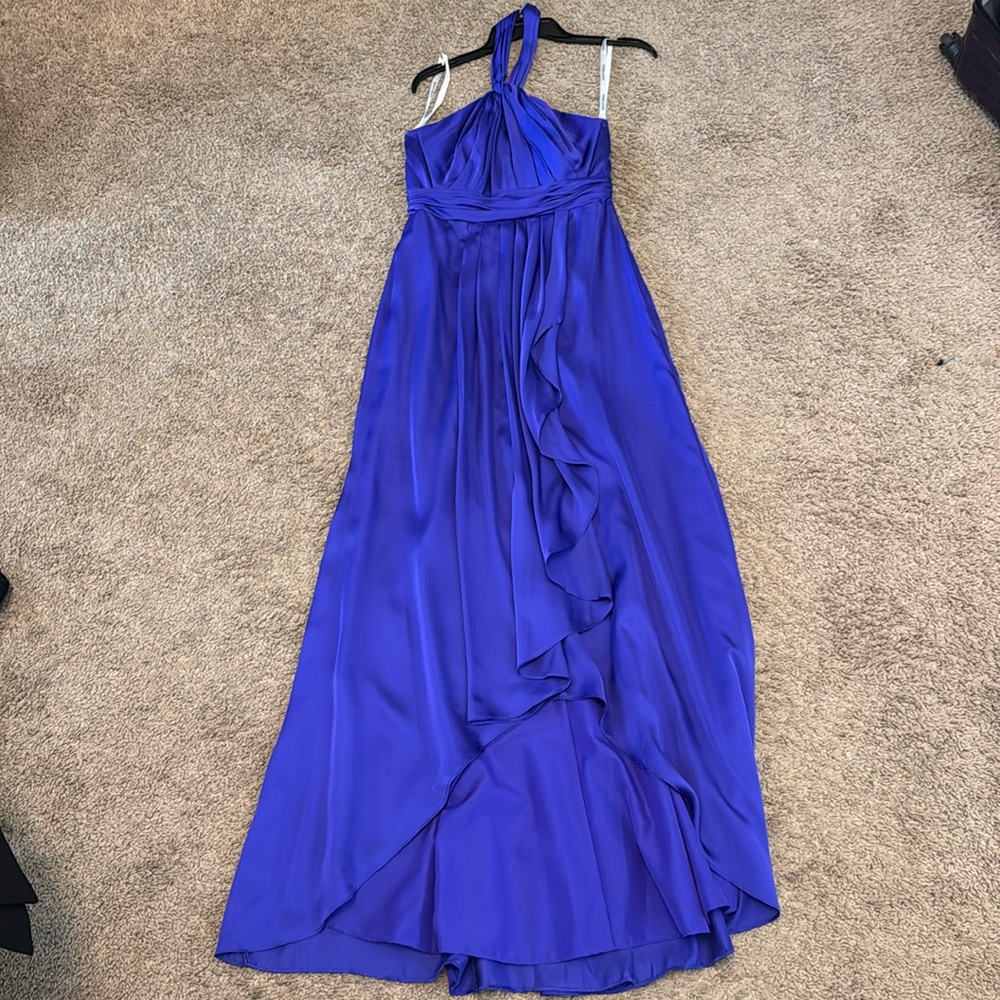 Like new bluish purple halter gown. Size 4.